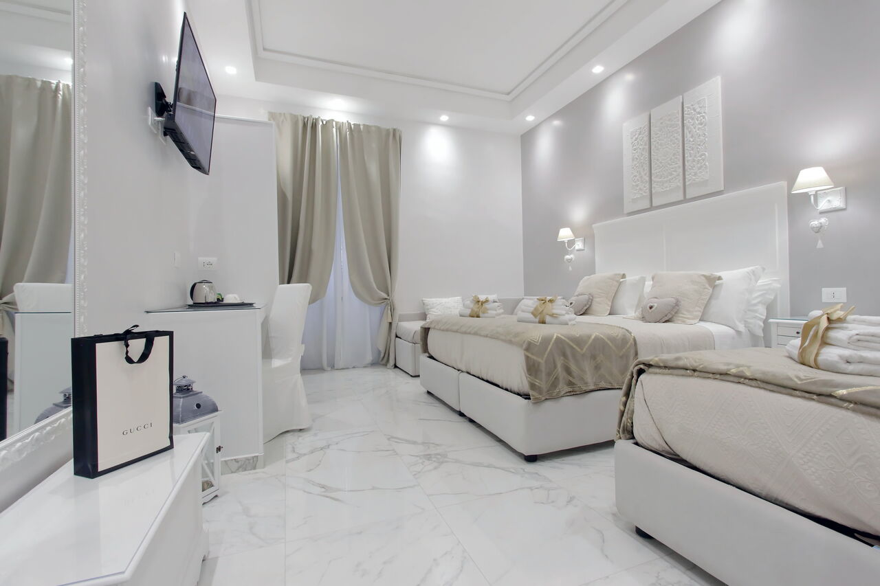 Camera Quadrupla Superior