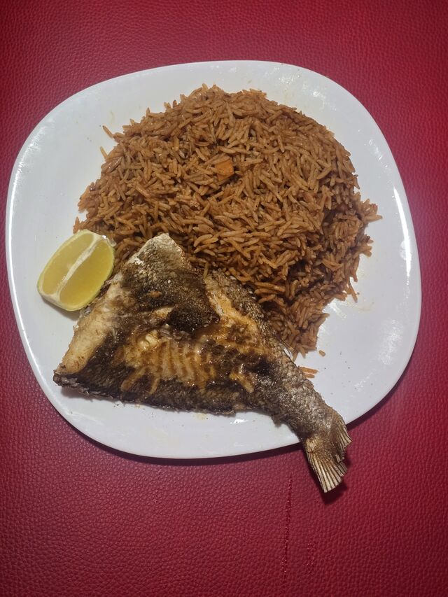 Joloff Rice con pescado ó carne ( costillas, pavo, alitas )