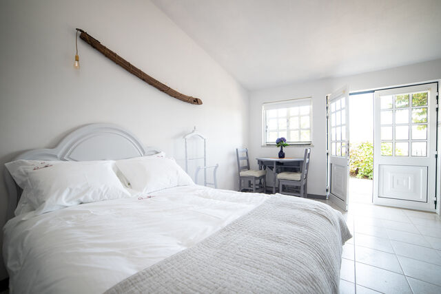 Zona dormir e entrada da casa