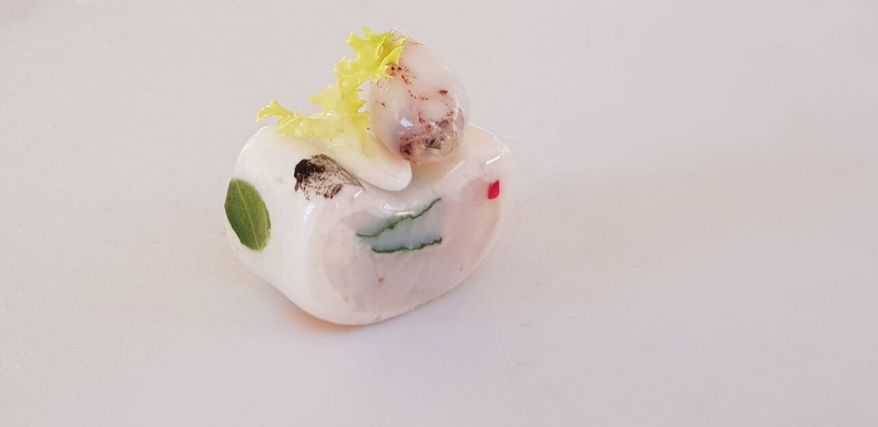 Finger food di merluzzo al vapore con calamaretti spillo