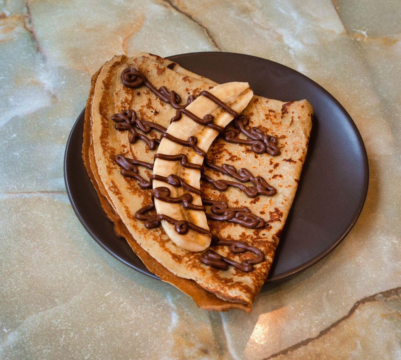 Crêperie 'AU BON COIN'
Crêpe Banane/Nutella