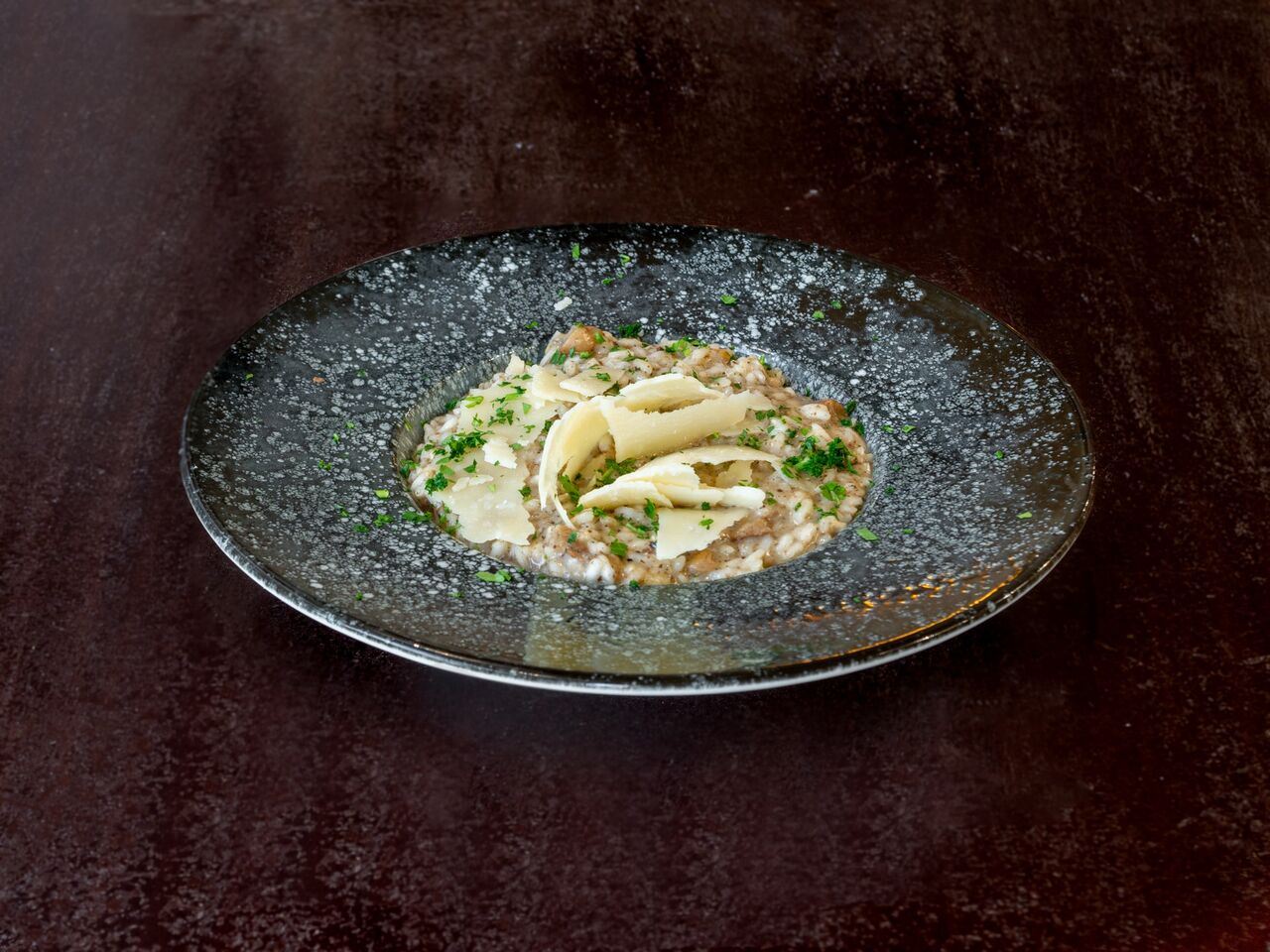 Risotto Ai Funghi Porcini e Perle Al Tartufo Nero