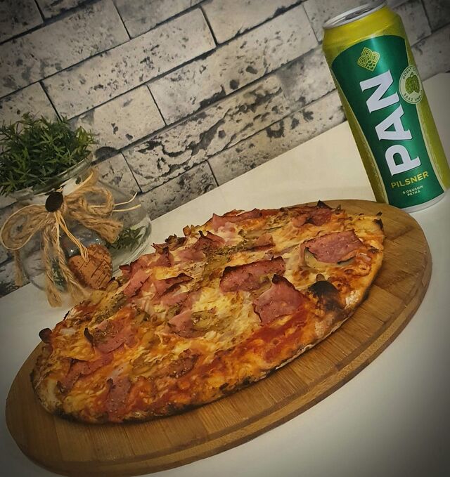 ** uz svaku naručenu pizzu,dobijete Pan Pilsner gratis **
