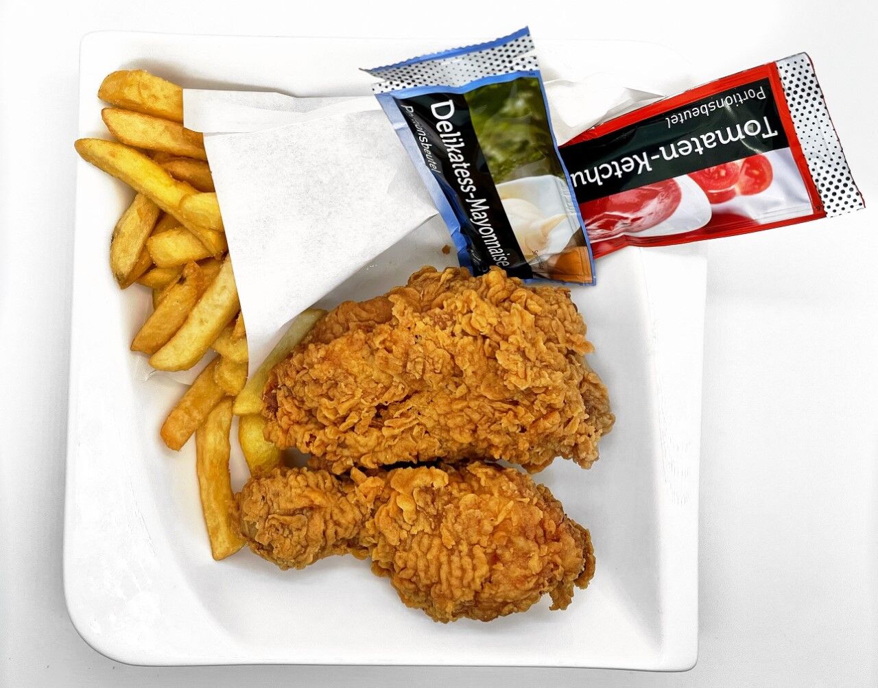 Chicken Burger und Crunchy Pommes