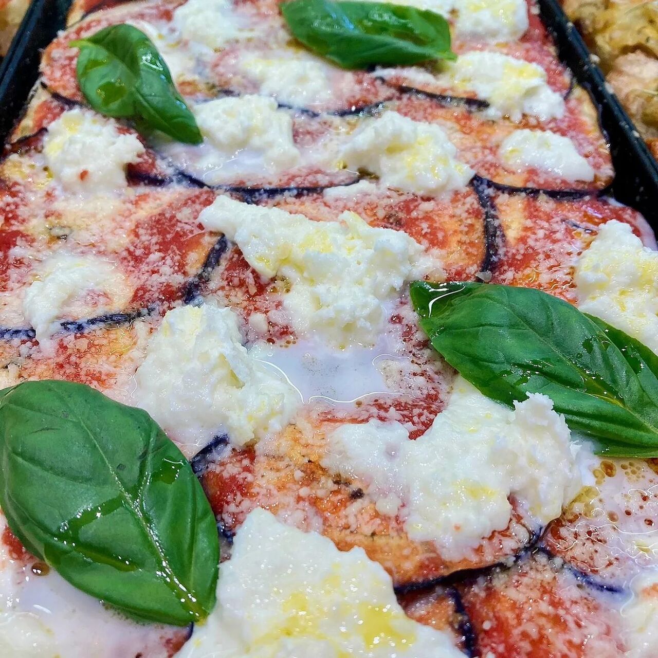 Parmigiana con bufala e basilico