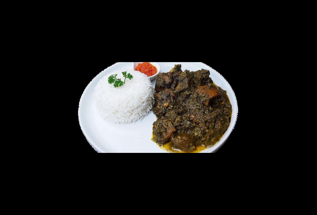 Feuilles de manioc pilées avec de la viande de porc (Ravitoto sy henakisoa)