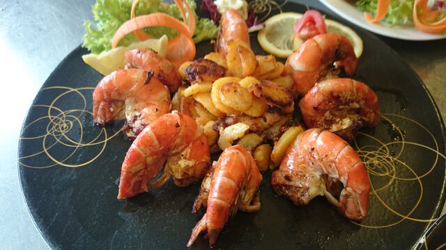 Scampi mit Bratkartoffeln ( auf Wunsch des Gastes)