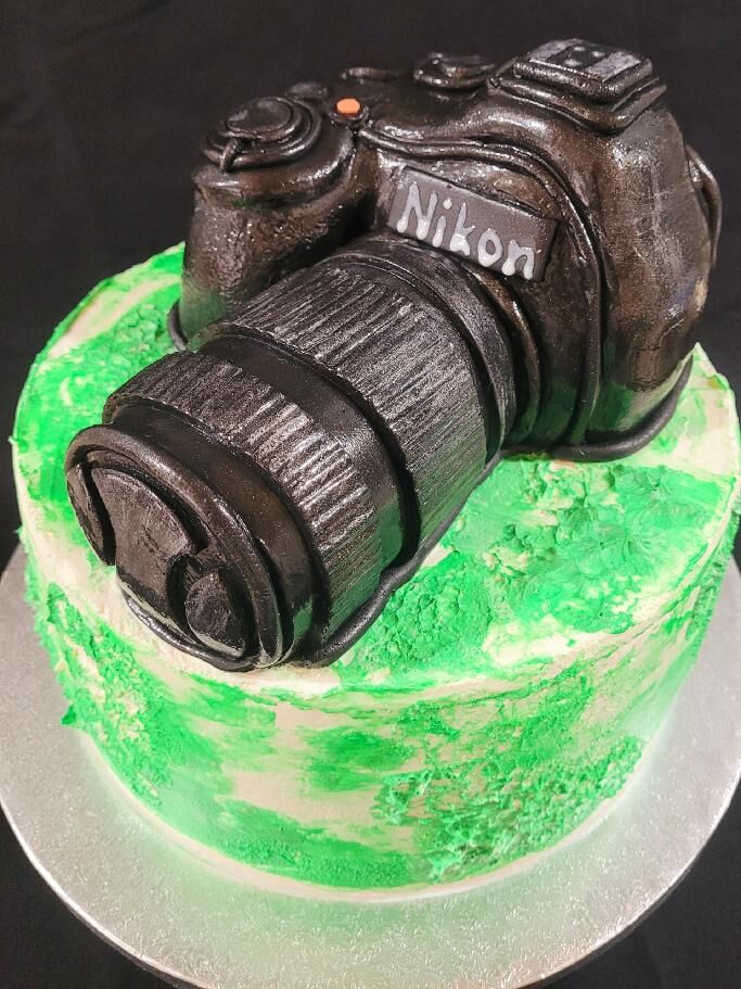 Modelovaný foťák Nikon