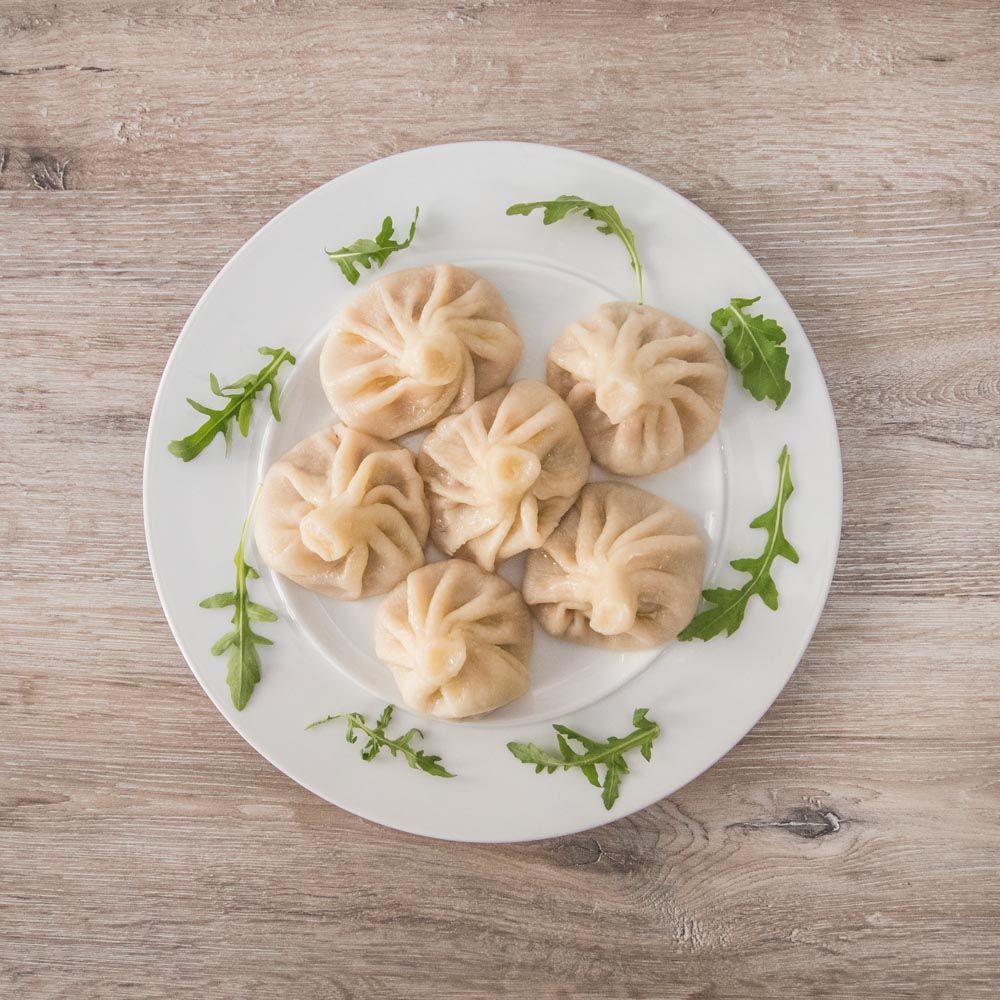 Chinkali gruzińskie pierogi z mięsem wieprzowo wołowy i rosołkiem w środku