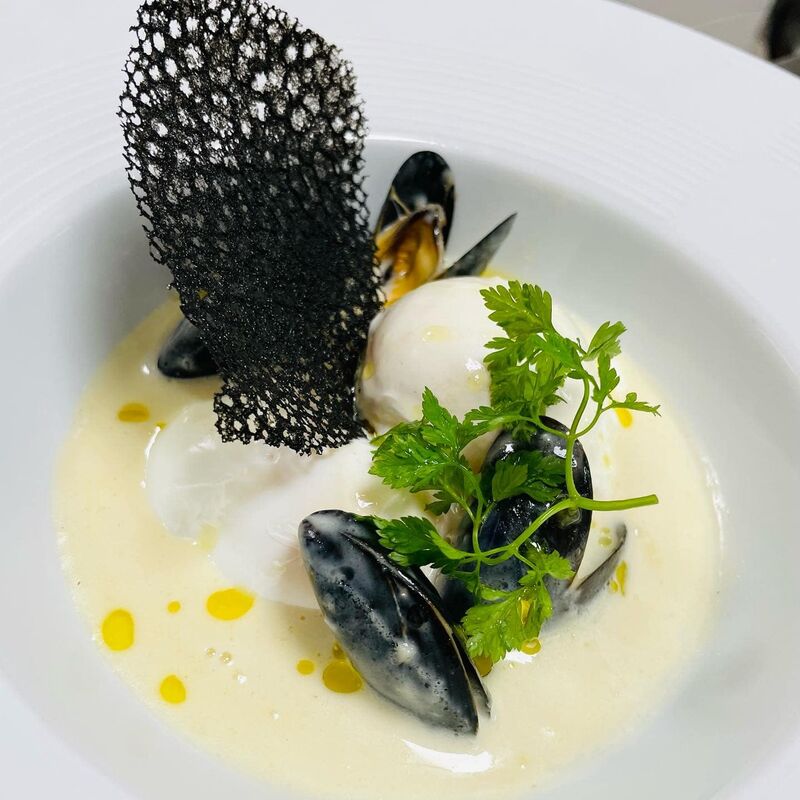 Oeufs pochés en marinière de moules