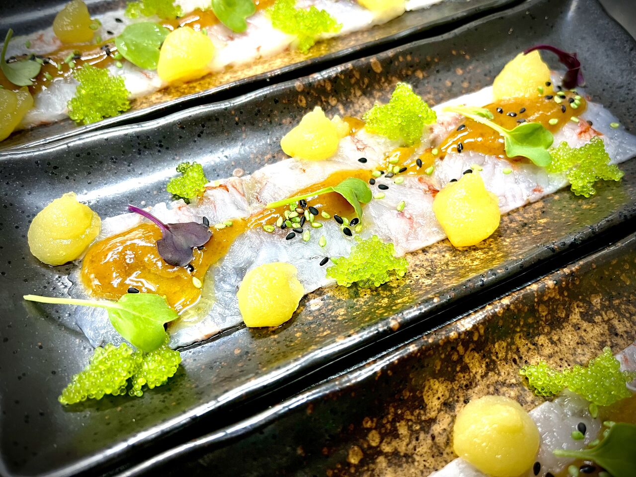 Carpaccio de gambes, garota, wasabi i citrics
