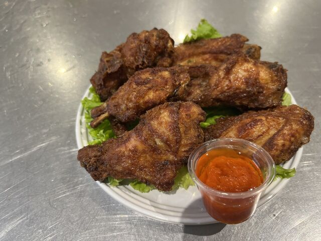 Aile de poulet frit et mariné par nos soins 