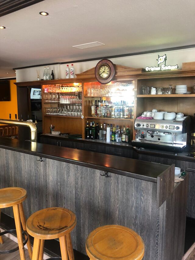 An unserer Bar können sie mit ihren Freunden oder auch alleine den Alltag gemütlich ausklingen lassen