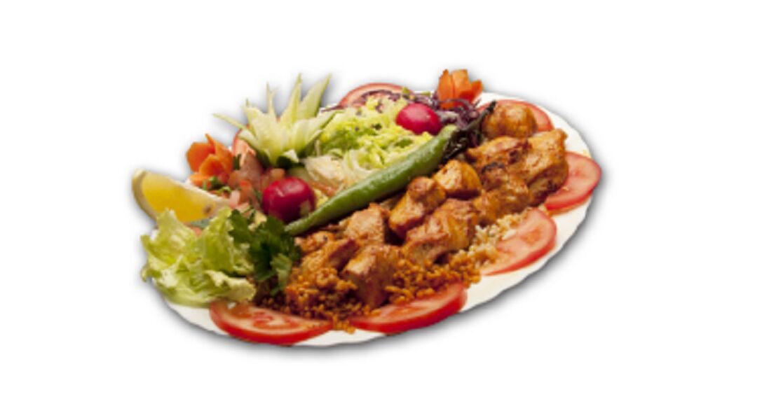 Brochette de Poulet - 14 EUR Brochette de poulet marinée, servie avec du riz et des légumes grillés.