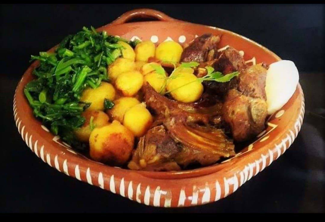 Cabrito assado em forno de lenha