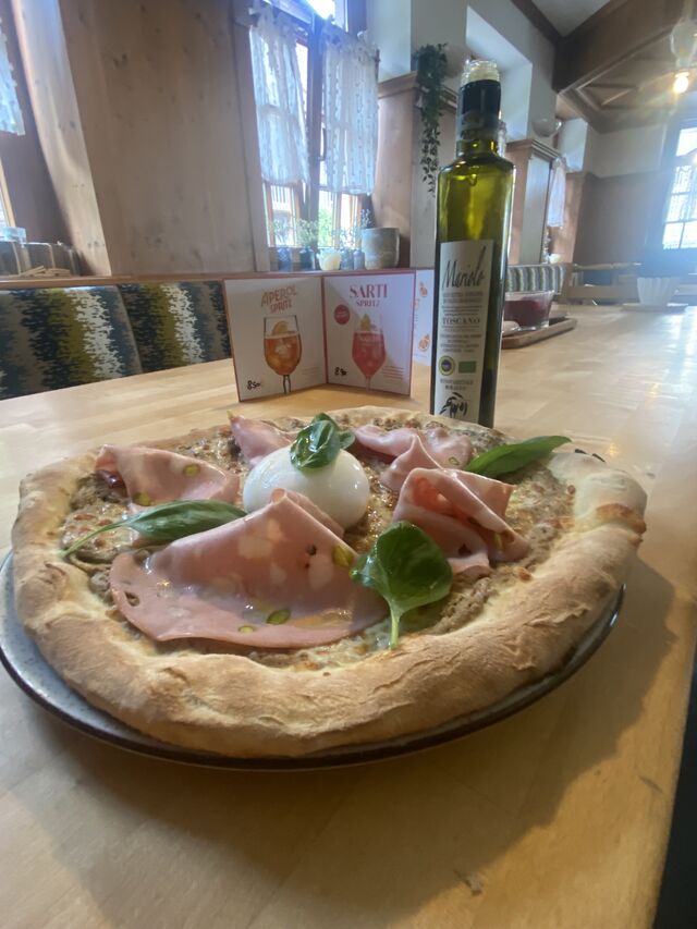 Bei uns ist Pizza eine Verführung...