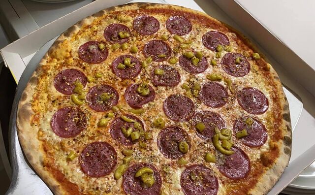 Familienpizza zum Mitnehmen