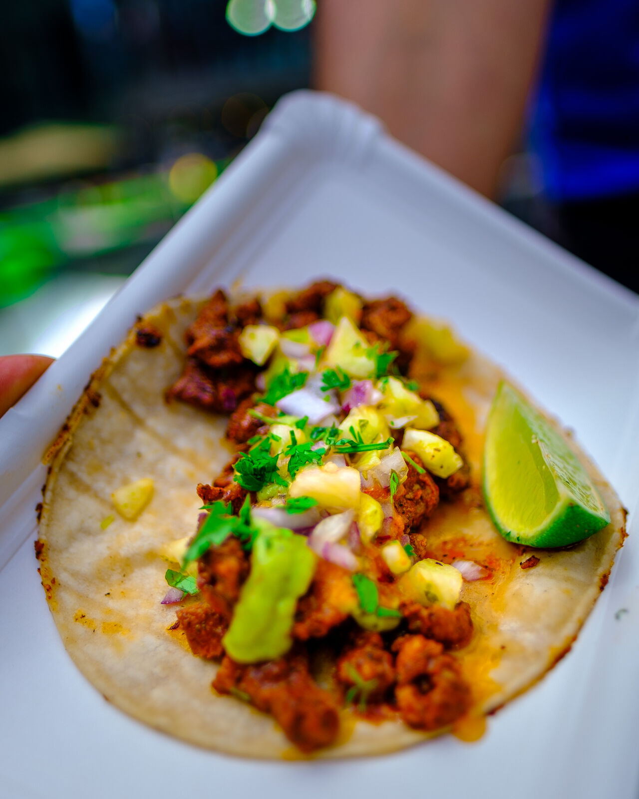 TACO AL PASTOR, the house specialty. Pork neck marinated with Mexican spices with a traditional pineapple sauce. 
