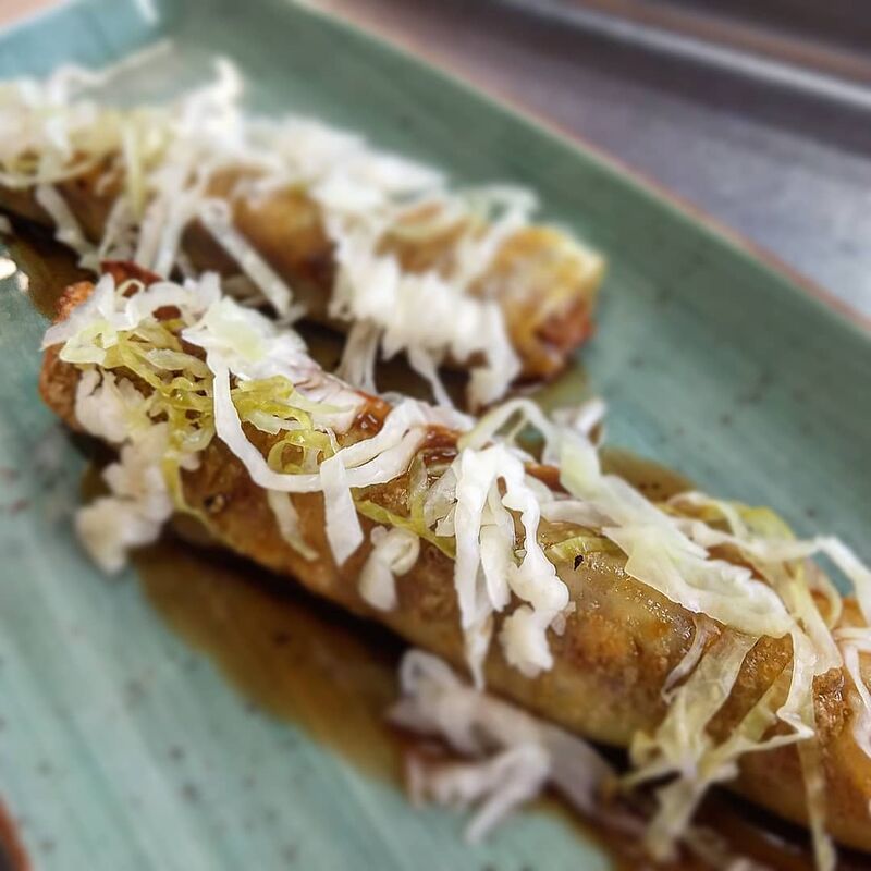 Canelon Careta de Cerdo y Col Encurtida