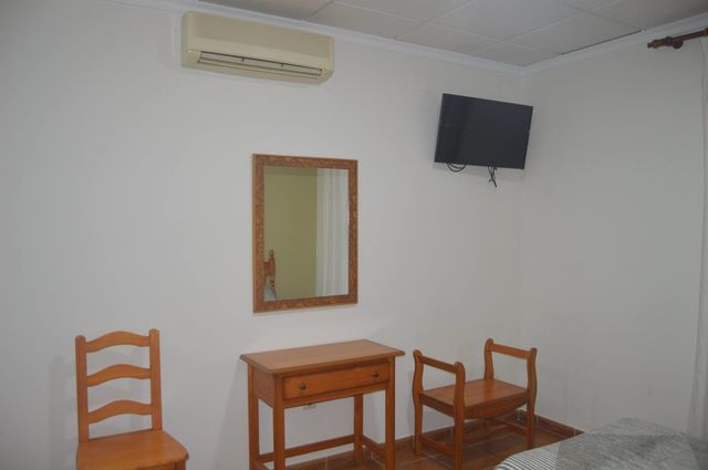 Habitaciones con TV y aire acondicionado 