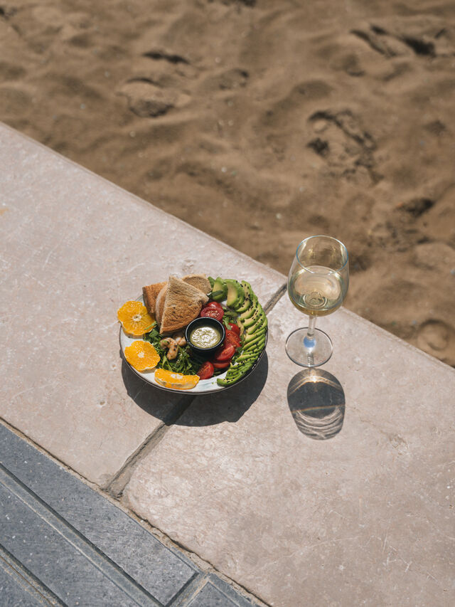 Shrimp and avocado citrus salad by the beach