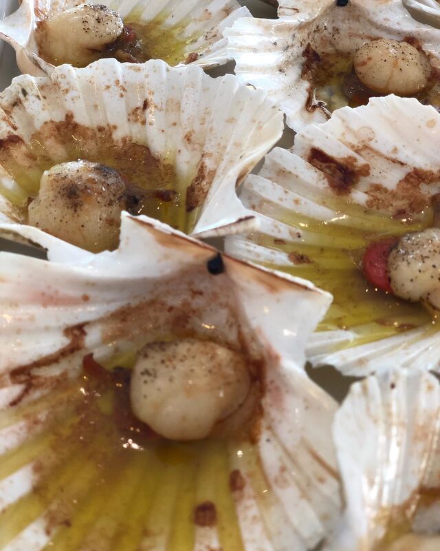 Capesante al forno .