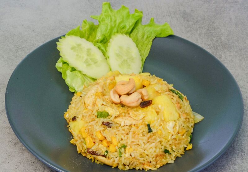 Riz sauté Thaï curry / ananas Poulet ou Crevettes 11.90€ TTC la portion