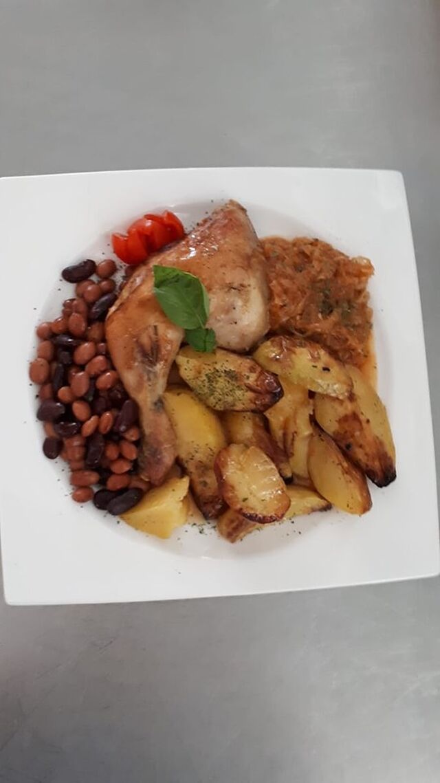 Chicken drumstick with side dishes