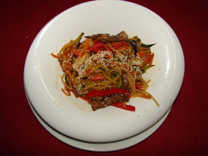 Wok - Chinese dish with noodle or rise.