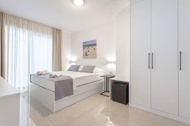 Quatruple Room Balcony Bedroom