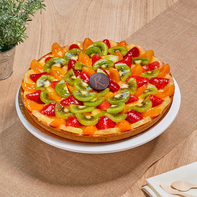 TARTE PRINTANIERE
Dès 2,20€ la part
Mousseline garnie de fruits :kiwi, fraises, ananas et abricot,pâte sucrée
