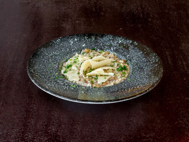 Risotto Ai Funghi Porcini e Perle Al Tartufo Nero