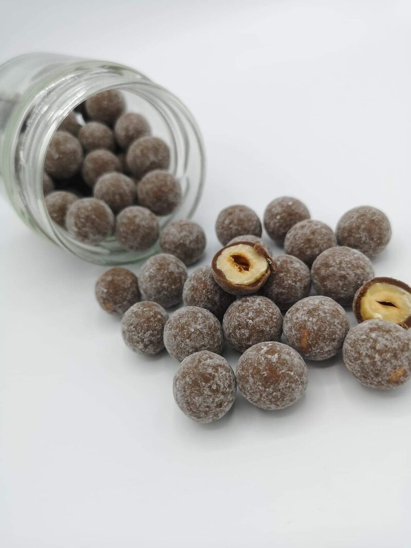 Noisettes enrobées de chocolat au lait