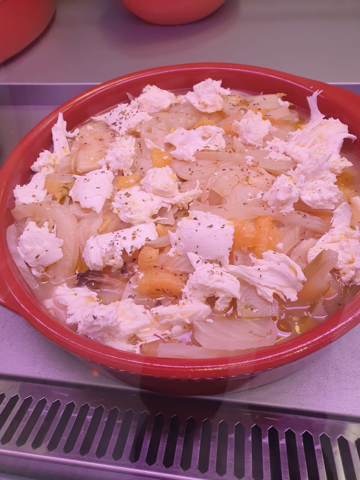 Ensalada de hinojo pochado en zumo de naranja con mozzarella de búfala