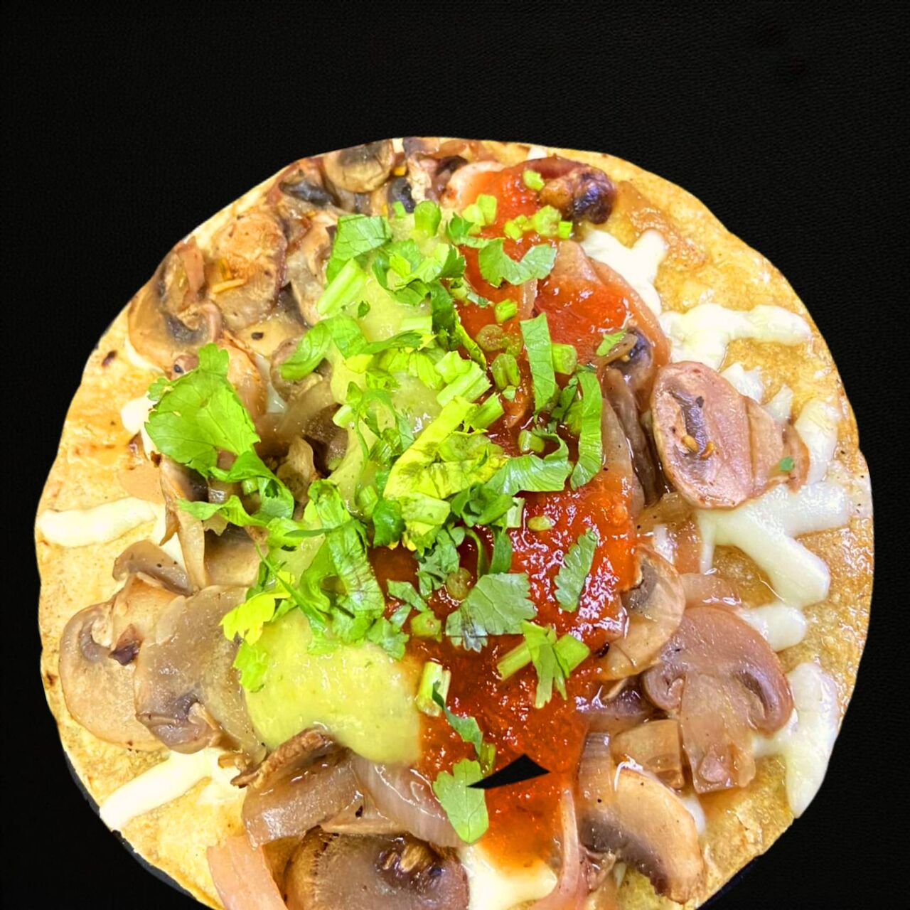 MUSHROOMS Fine herbs, red onion and a touch of lime. Everything in a corn tortilla with malted cheese