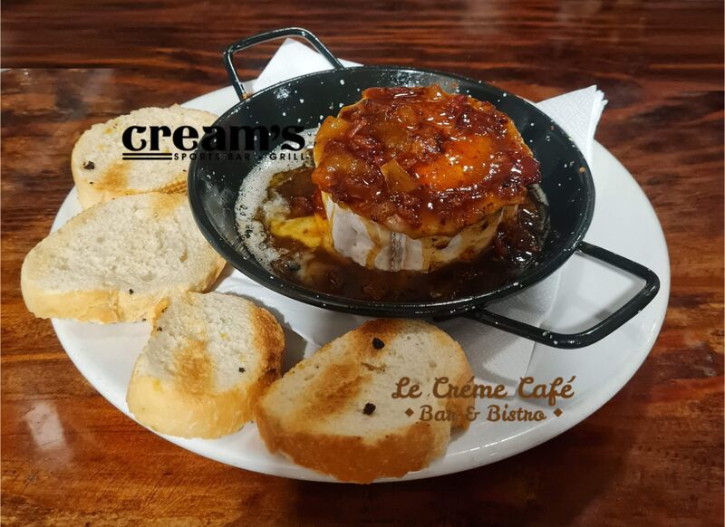 SMOKED GOAT CHEESE ROLL TOPPED W/APRICOT BACON JAM