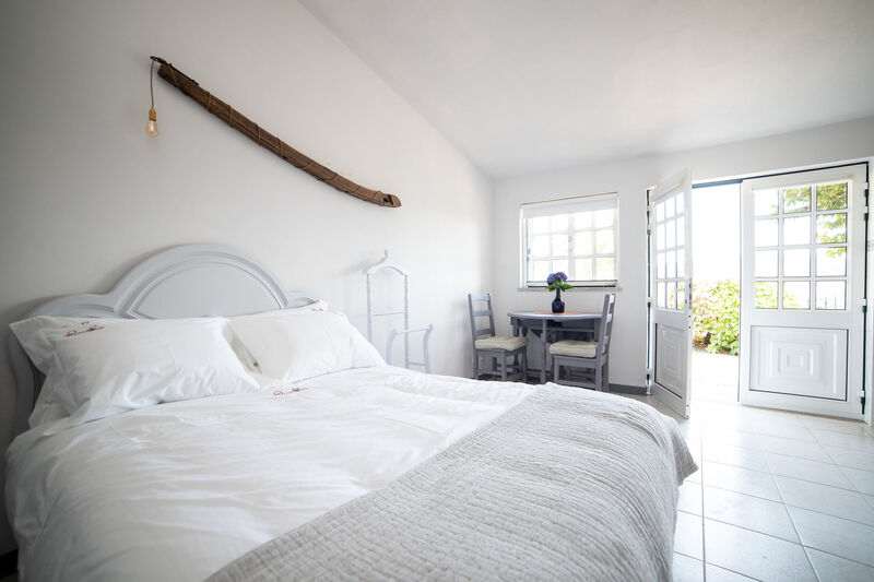 Zona dormir e entrada da casa