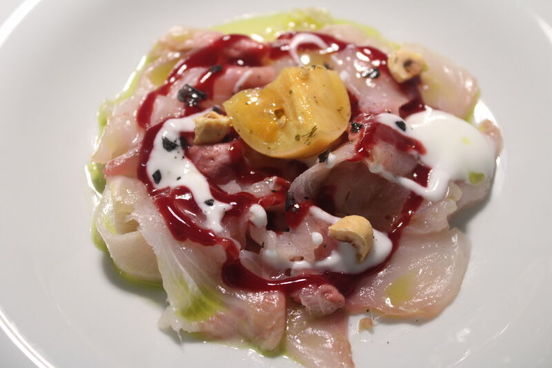 Carpaccio di Ricciola con amarasche, nocciole tostate yogurt magro