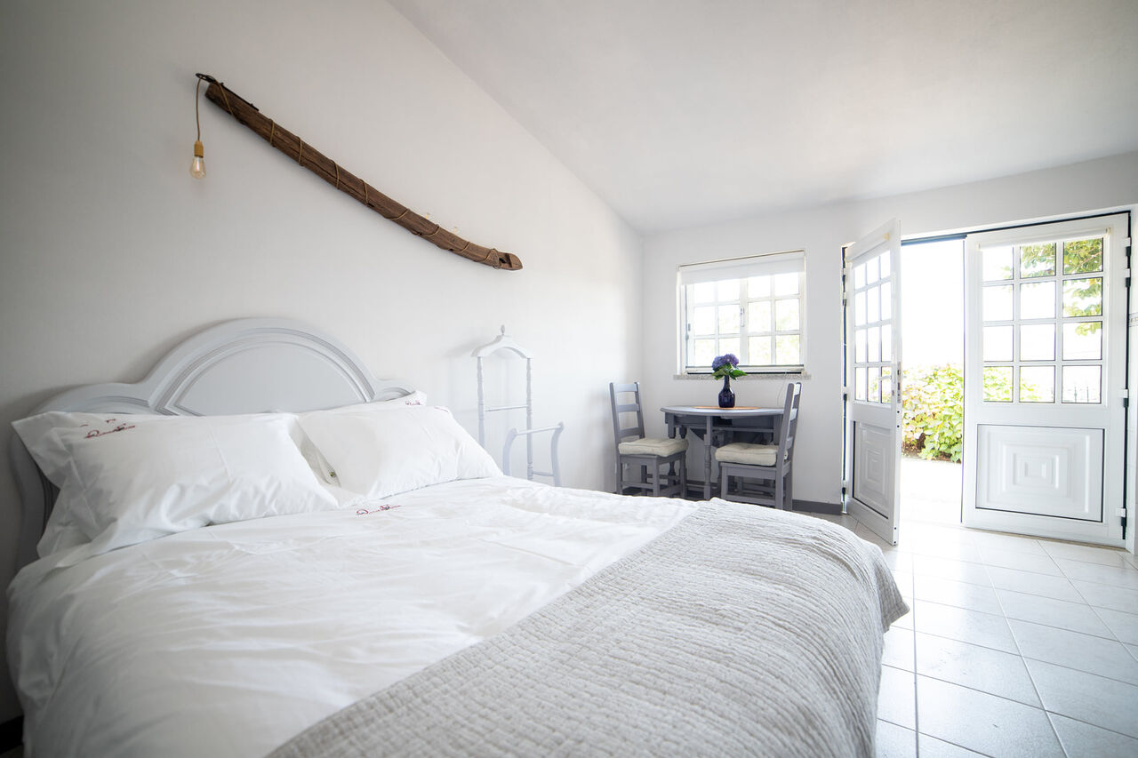 Zona dormir e entrada da casa