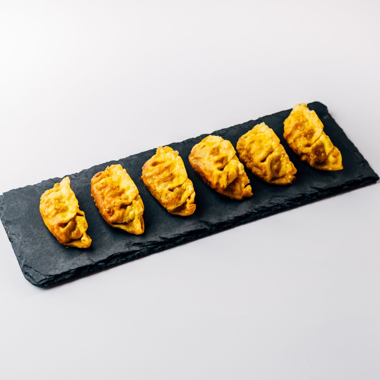 Gyozas de pollo al curry