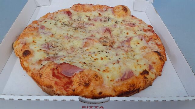 Pizzas artisanales cuites sur pierre