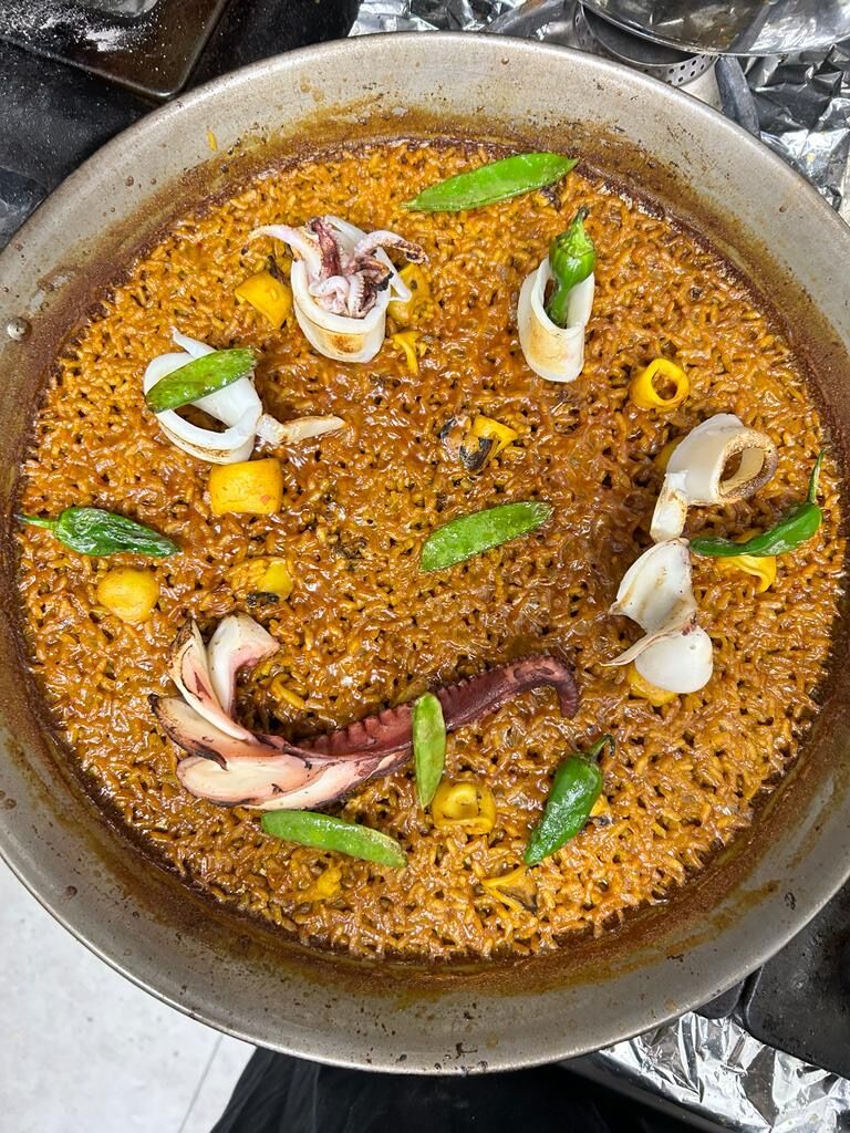 Arroz de pulpo braseado y calamar playa