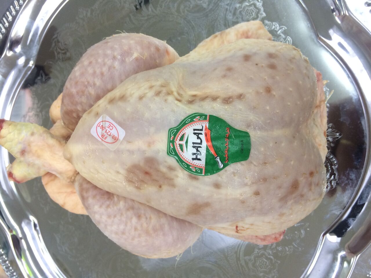 Poulets (prêt à cuir: 1,8 kg : 2=15€ )