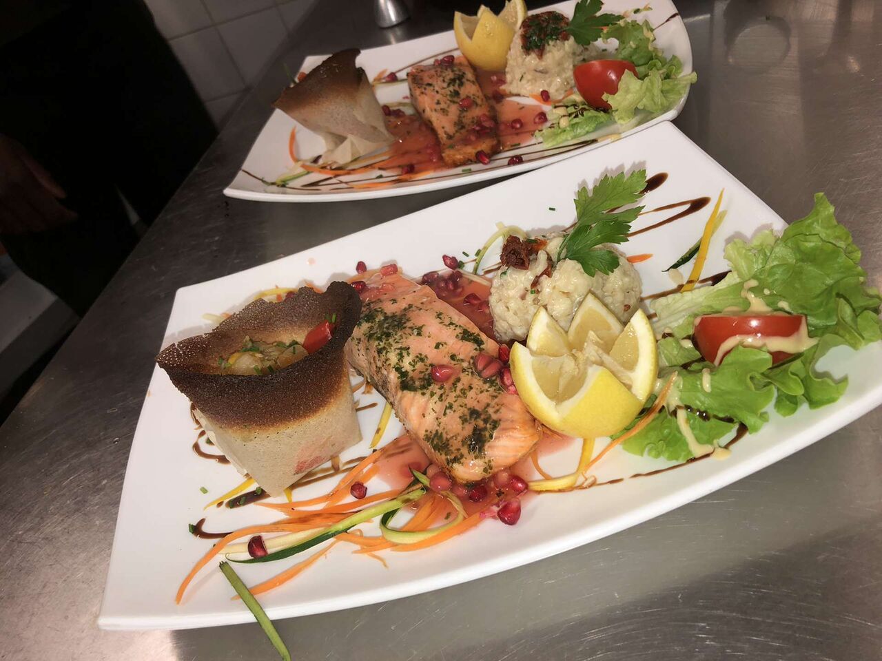 Pavé de saumon à la grenade et ses légumes