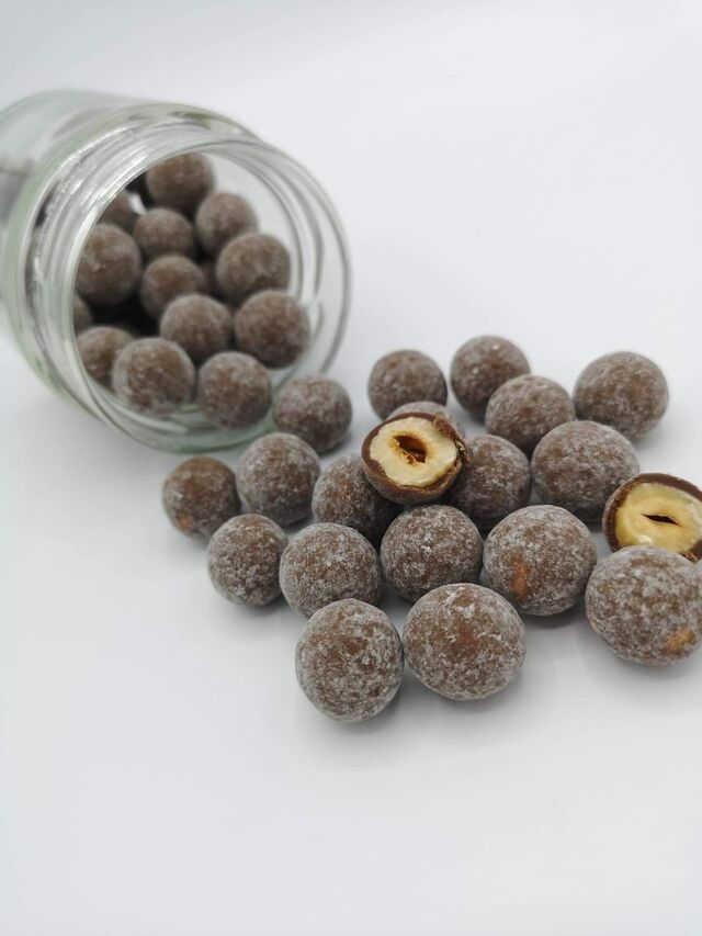 Noisettes enrobées de chocolat au lait