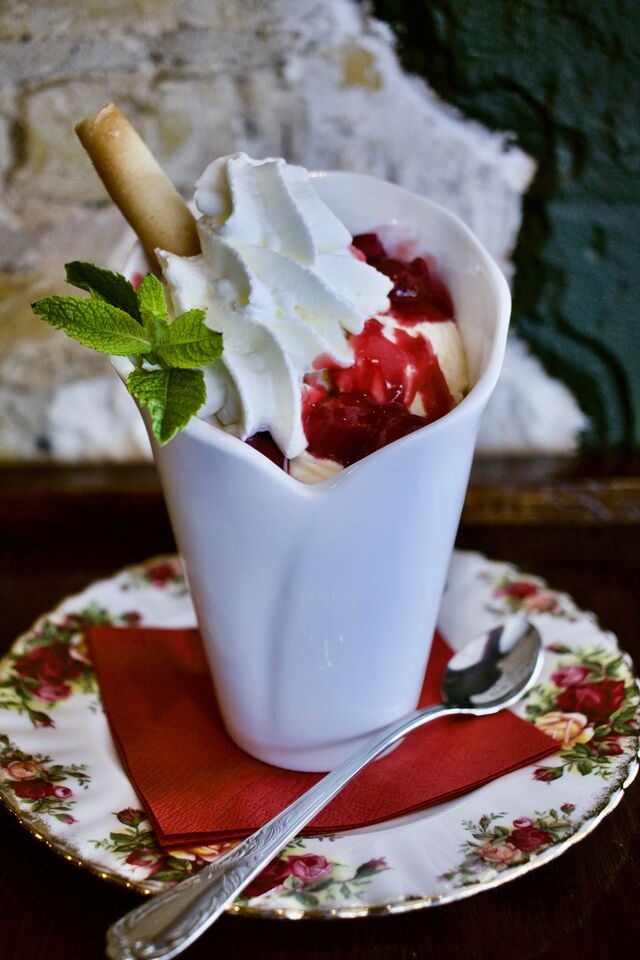 Vanilla Cherry Cup - 3 scoops of vanilla ice-cream with hot cherries and whipped cream