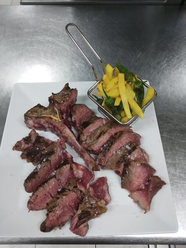 T Bone exquisita carne a la parrilla