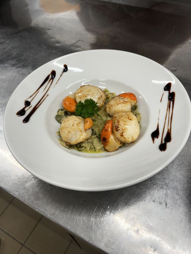 Noix de st Jacque sur lit de poireaux