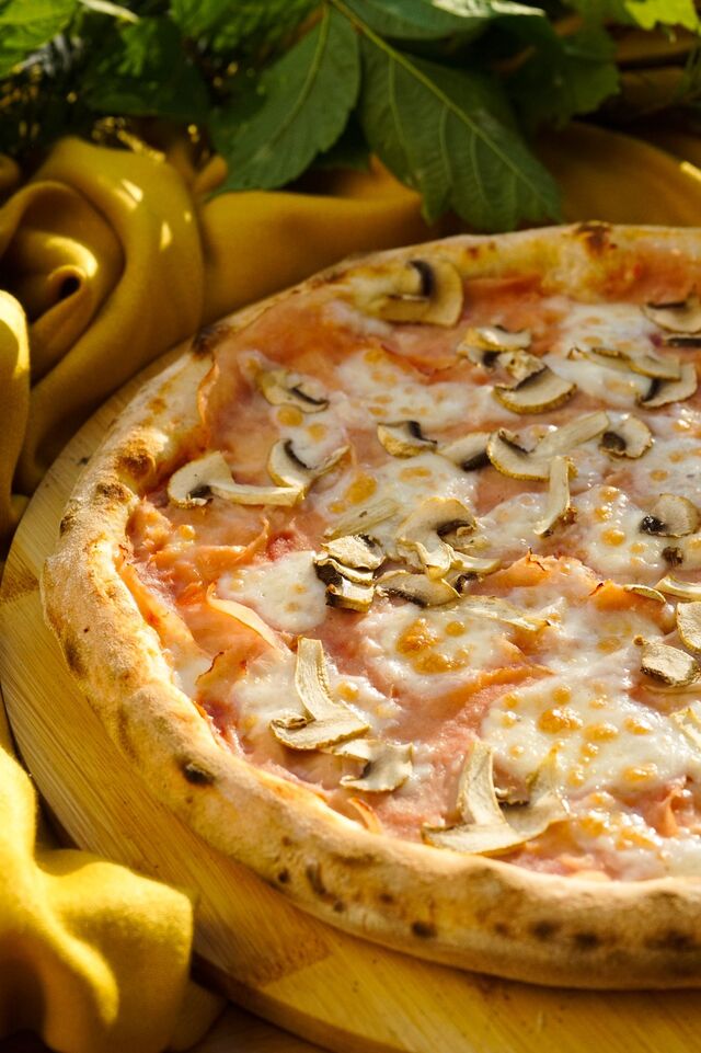 Pizza prosciuto e Funghi 