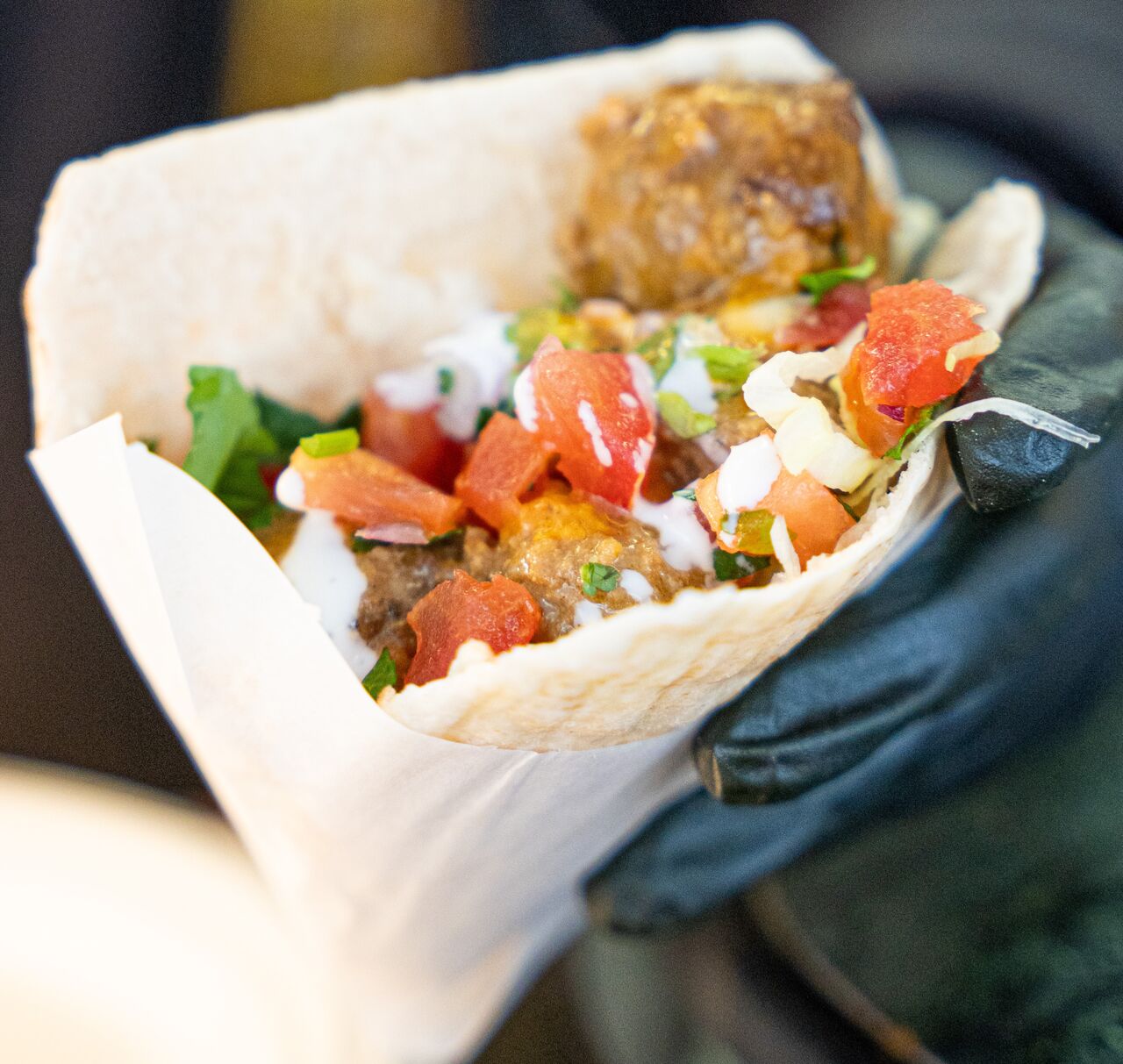 Bobotie(Rinderhackbällchen in Kokosmilch Currysoße) im Pitabrot